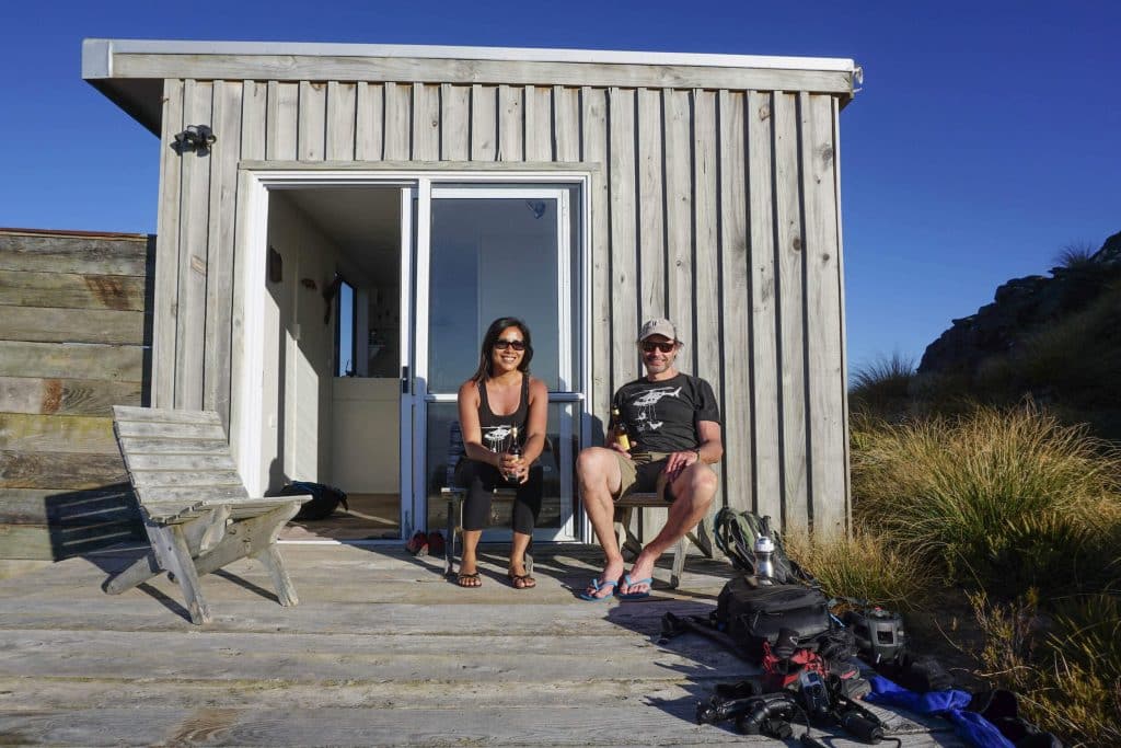 TAKING IN THE VIEW OVER THE VALLEY. ON THE DECK OF THE SLATE HUT, ENJOYING A COLD BEVERAGE AFTER A HARD DAY OF MTB RIDING AND HIKING!