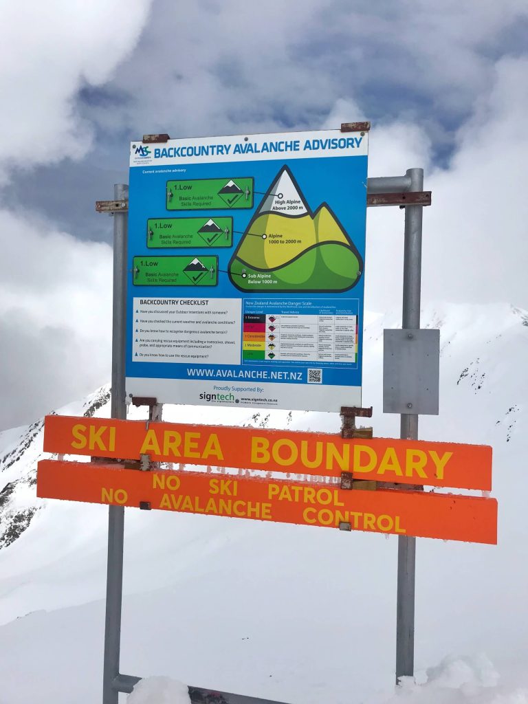 THE VERY HANDY AVALANCHE ADVISORY SIGN AT THE TOP OF THE RIDGE T-BAR.