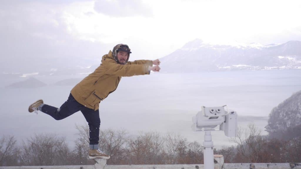 A RECENT AND RARE PHOTO (HE'S USUALLY BEHIND THE CAMERA) TAKEN OF JAMES AT LAKE TOYA IN HOKKAIDO, JAPAN.