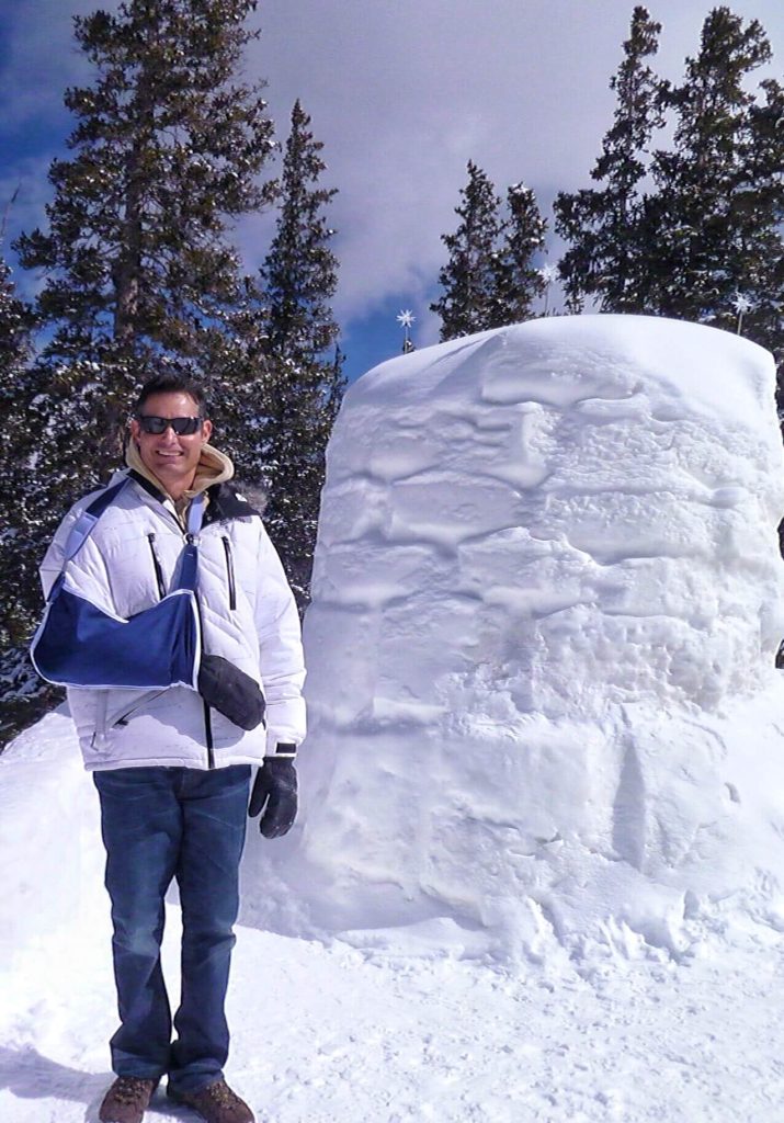mick in front of snow sculpture keystone